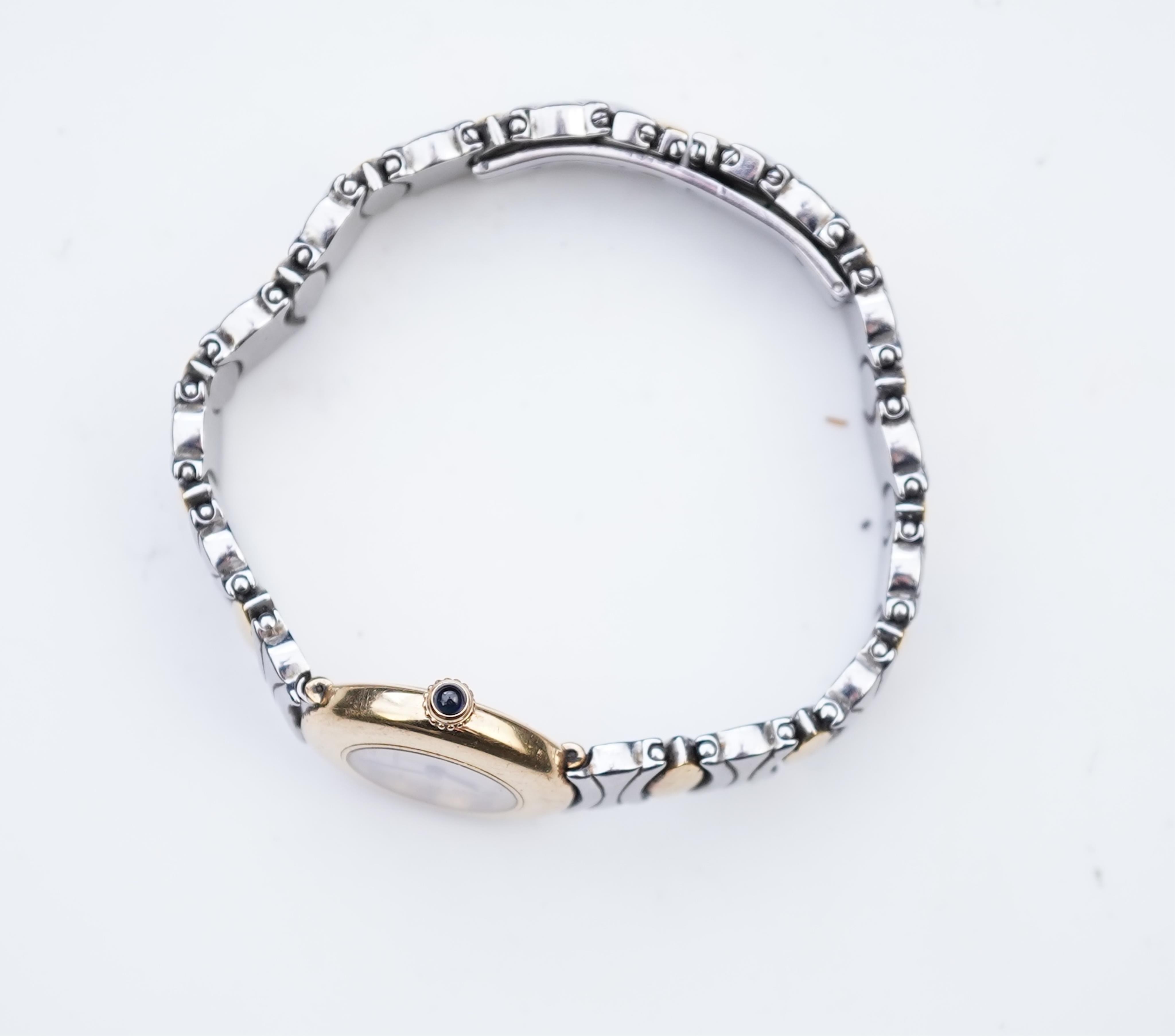 Cartier, a lady's gold and stainless steel wristwatch, 'Colisée', ref.8057908C